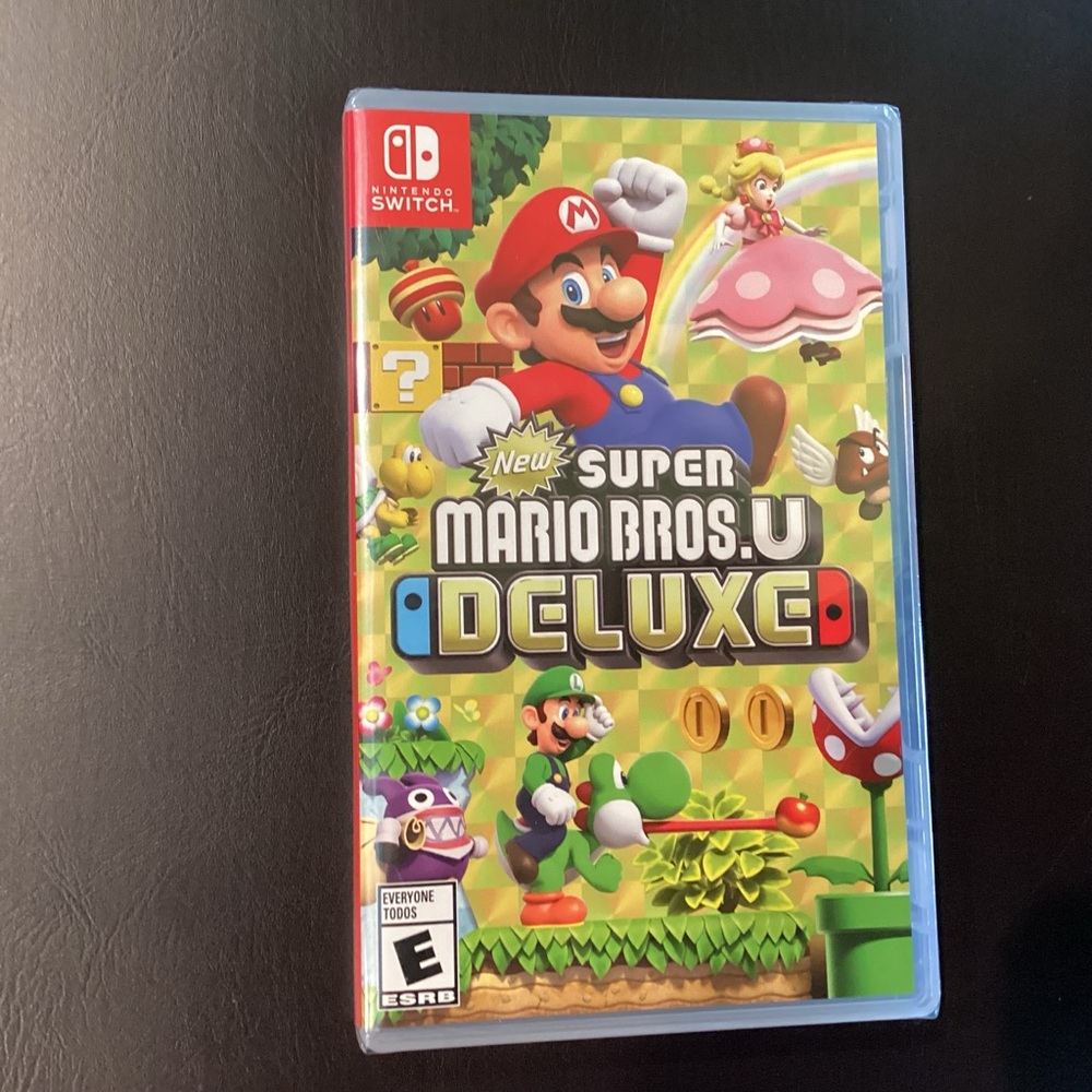 Unopened Sealed Nintendo Switch New Super Mario Bros. U Deluxe - Red and Green